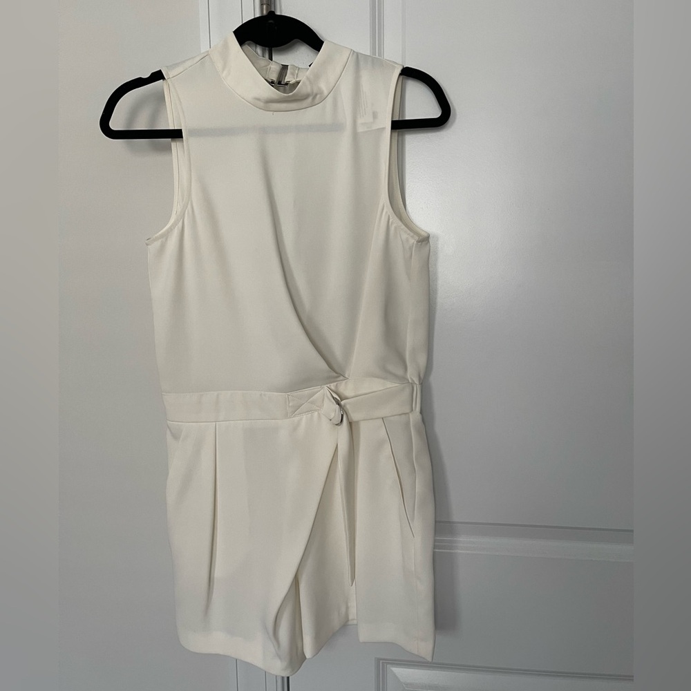 Sleeveless Ivory Jumpsuit with Waist Tie